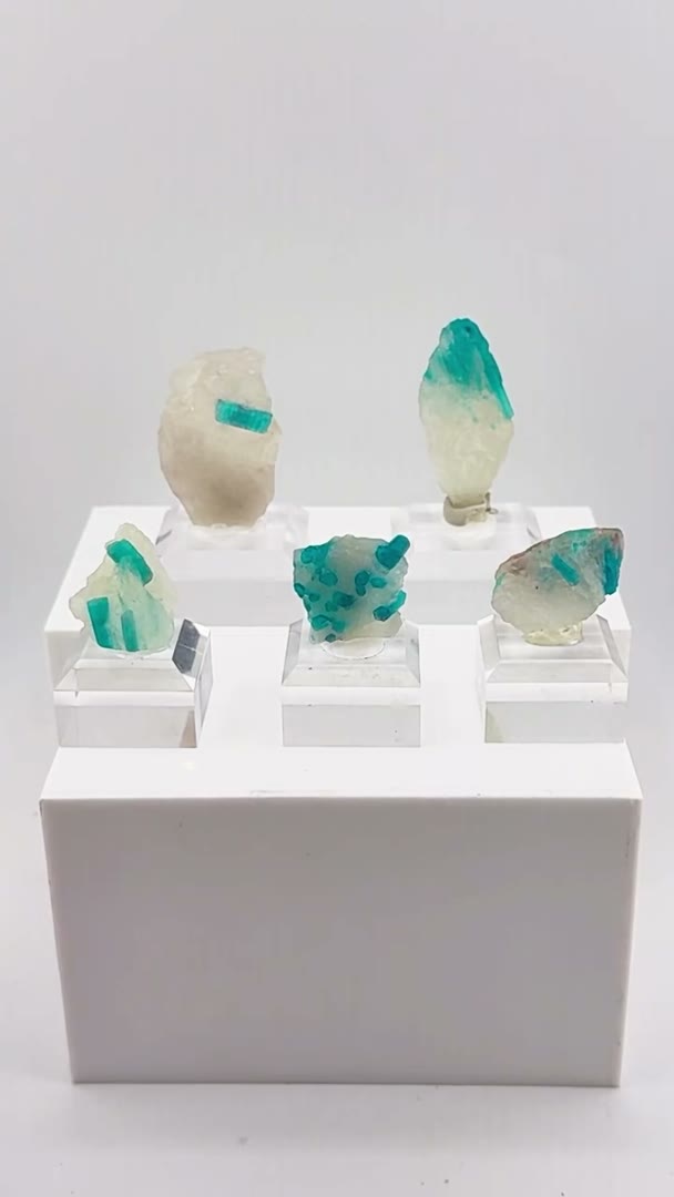 Five electric blue Paraíba tourmalines frozen in quartz… from the legendary…